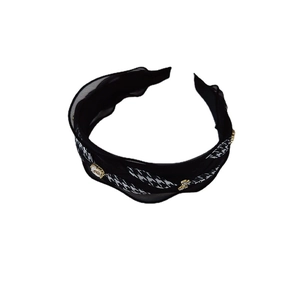 Elegant houndstooth headband with black mesh trim and golden rhinestone accents