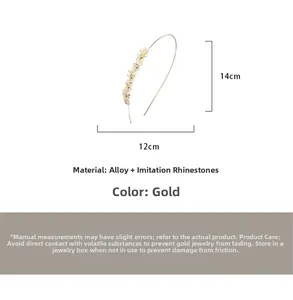 Detail view of cat eye stone butterfly headband with gold alloy frame and size markers