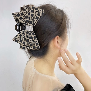 Grande molletta per capelli con fiocco a scacchi, strass e motivo monogramma da donna