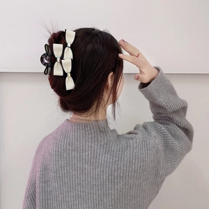 Elegant oversized ribbon hair claw clip with rhinestones for Korean style updos
