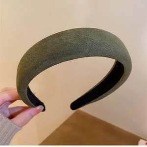 Retro green padded headband in soft velvet fabric with a stylish high top design