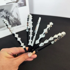 Detailed close-up showing six different geometric sparkling rhinestone headband designs