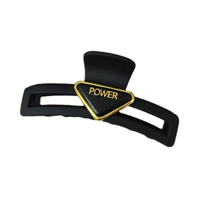Matte black triangle hair claw clip with golden Power text for women hairstyles
