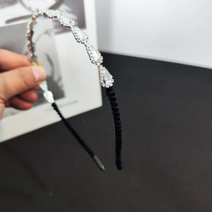Elegant silver crystal headband with sparkling teardrop rhinestones for party wear