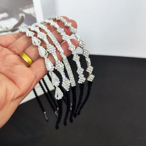 Detailed view of 5-piece rhinestone headband set with crystals and metal base