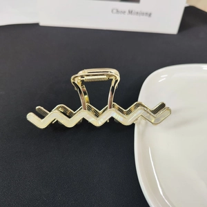 Elegant gold wave hair claw clip with mother of pearl shell inlay for thick hair