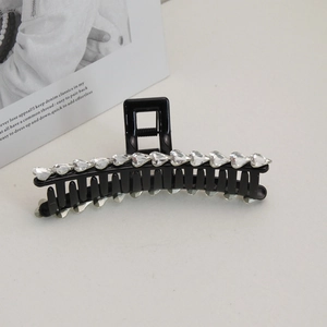 Elegant large black hair claw clip with sparkling heart-shaped rhinestones for women