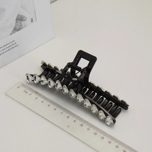 Elegant large black hair claw clip with heart-shaped rhinestones, length 12cm for long hair