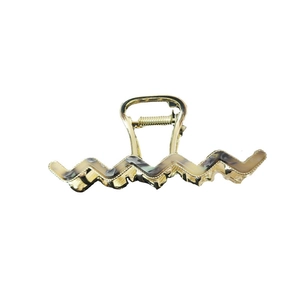 Wavy acetate hair claw clip with golden metal frame and marble patterns for women