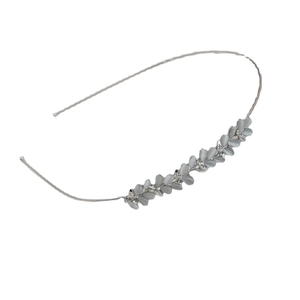Elegant silver headband featuring cat eye stone leaf details and shimmering rhinestones