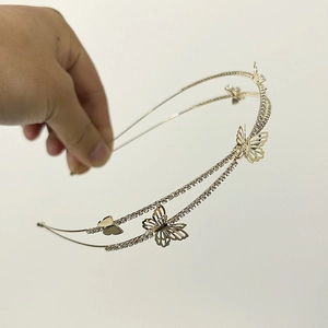 Elegant gold double-layered butterfly headband with white rhinestones for girls