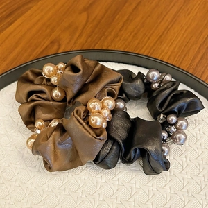 Elegant silk satin hair scrunchies with pearls and crystals in brown and grey colors