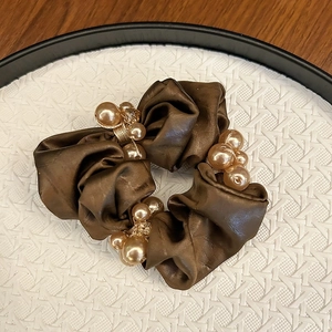 Elegant dark brown satin scrunchie with champagne pearls and sparkling crystals