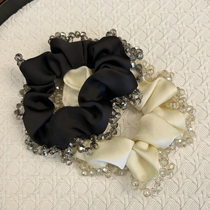 Elegant satin scrunchie set in black and cream featuring crystal beaded edges