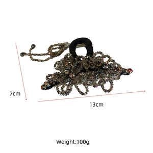 Detailed view showing dimensions 13cm by 7cm of handmade beaded hair claw with soft grey beads