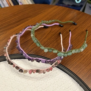 Three elegant beaded headbands with polished gemstones in olive green, lilac, and smoky pink