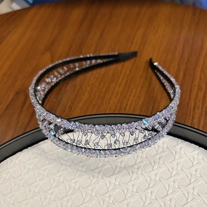 Luxurious double-layered crystal headband with shimmering rhinestones and black frame