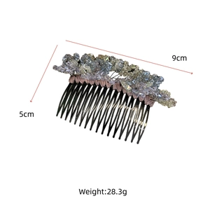 Macro view of handmade crystal hair comb showing precise 9cm by 5cm dimensions