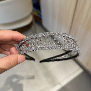 Detailed macro view of handmade crystal headband with hollow wire and sparkling stones