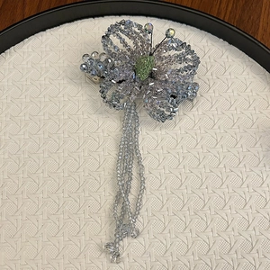 Handcrafted blue crystal butterfly hair clip with beaded tassels and metal spring clamp