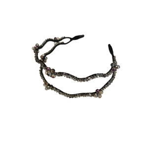 Elegant double-layered crystal wavy headband with shimmering silver beads on a thin frame