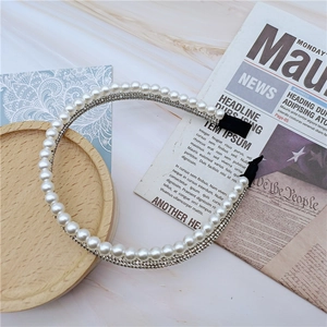 Elegant double-layered headband with white pearls and sparkling rhinestones for women