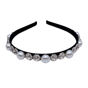Elegant pearl and rhinestone snowflake headband for women with a black fabric base