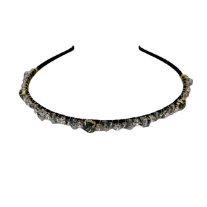 Elegant French vintage headband with pearls and green gems on minimalist black base