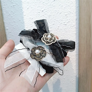 Elegant camellia hair ties with rhinestone lace bow and pearls in black and white