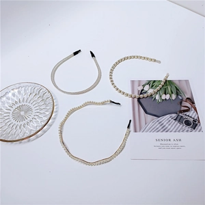 Three elegant French style pearl headbands with diverse bead sizes and gold metal frames