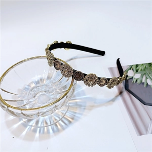 Close-up of vintage clock dials and sparkling rhinestones on an elegant headband