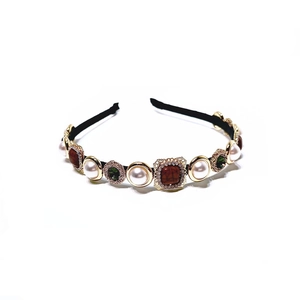 Baroque vintage headband with pearls and square red gemstone on white background