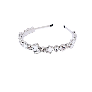 Elegant silver headband with various sparkling crystals and rhinestones on white background
