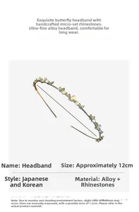 Detail of a 12cm gold alloy headband featuring butterfly charms and micro rhinestones