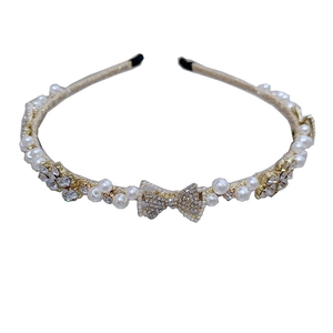 Baroque pearl and rhinestone butterfly headband in elegant gold finish for women