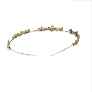 Elegant gold metal headband with butterfly charms and opal beads on white background