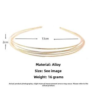 Vue détaillée d'un serre-tête multicouche en alliage doré de 16g avec 13cm de diamètre