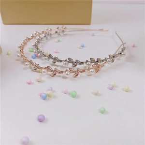 Elegant rose gold and silver pearl leaf headbands for women with a romantic forest style
