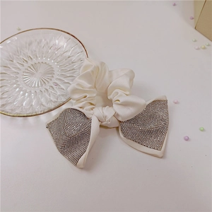 Elegant cream satin scrunchie with sparkling rhinestone butterfly knot for women
