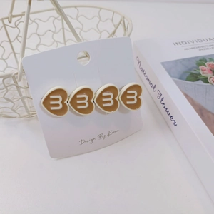 Lot de quatre barrettes à cheveux coréennes en forme de cœur crème et caramel