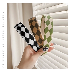 Three-piece set of checkered sponge headbands in black, brown and green fabric