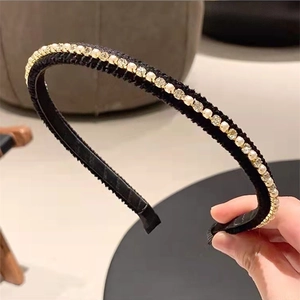 Elegant black headband with white faux pearls and sparkling rhinestones for women