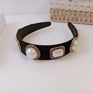 Baroque black velvet headband with large vintage pearls in ornate gold floral settings