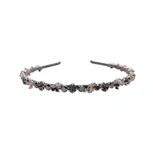 Elegant gold headband with dark grey rhinestones and small silver metal flower accents
