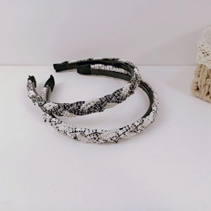 Detail showing elegant tweed texture and white pearl weaving on Korean style headbands