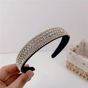 Luxurious wide headband with sparkling crystal rhinestones and gold woven edge