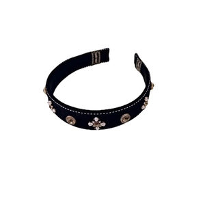 Vintage Baroque black velvet headband with pearls and rhinestones on white background