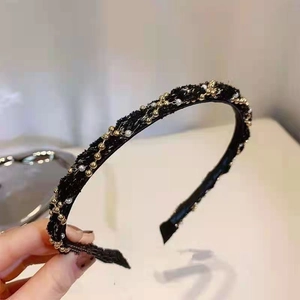 Elegant black tweed headband featuring gold metal beads and white imitation pearls