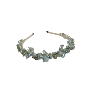 Elegant gold metal headband with morandi grey-green crystal beads on a white background