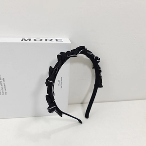 Serre-tête noir élégant avec nœud et bordure blanche pour femme, accessoire quotidien